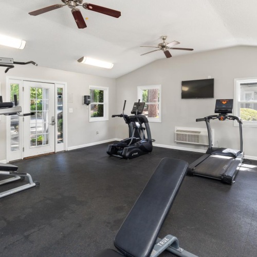a gym with treadmills