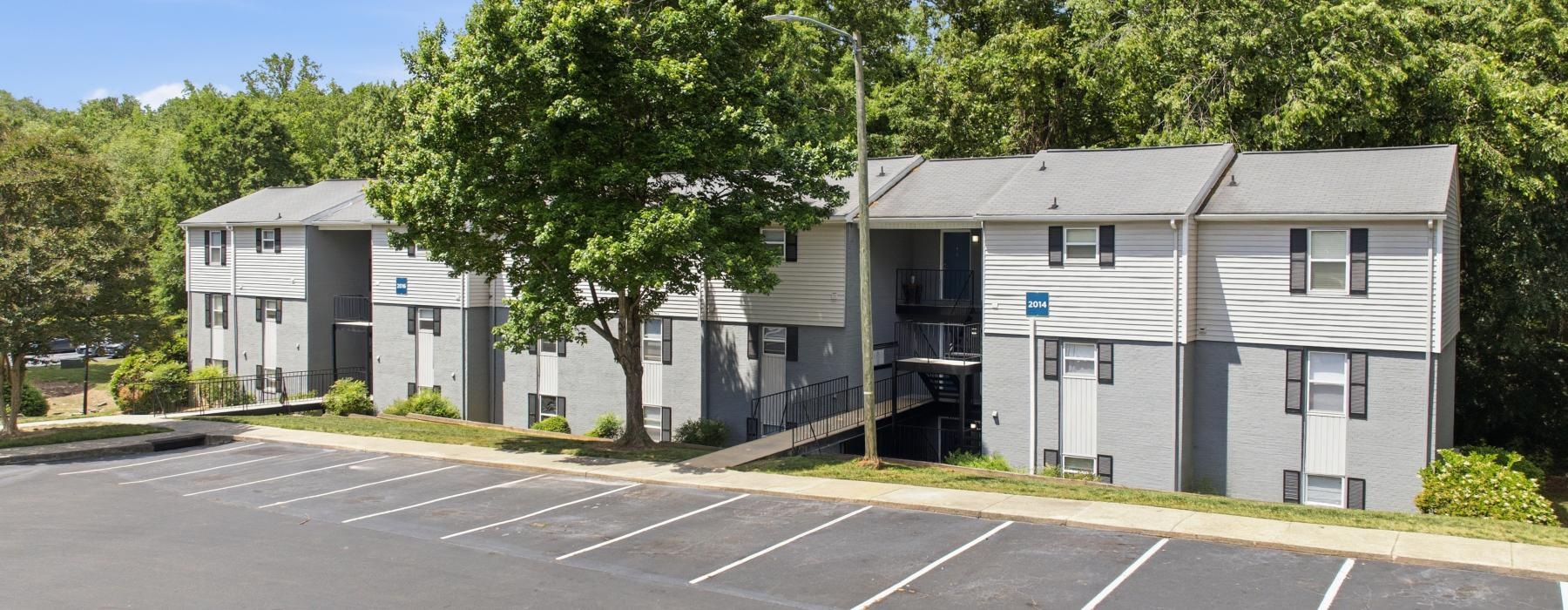 a building with trees in the front